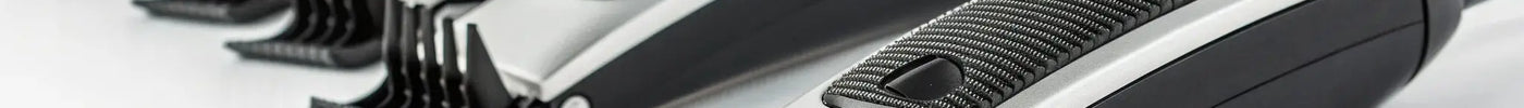Andis T-Outliner trimmer with guide combs for wholesale purchase.