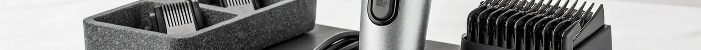 Wahl Pro Series lithium ion clippers with guide combs, charger, and grooming accessories.