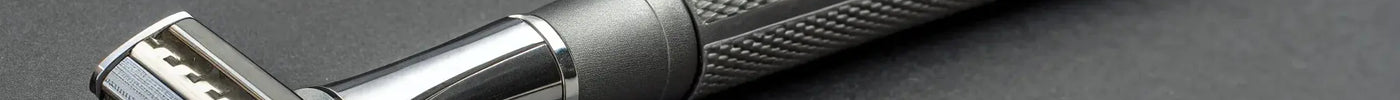 A metal t-blade outliner trimmer for sharp lines, fades, and hair designs.