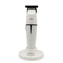 “Charging dock and JRL GHOST Cordless Hair Trimmer set, highlighting its sleek white design”