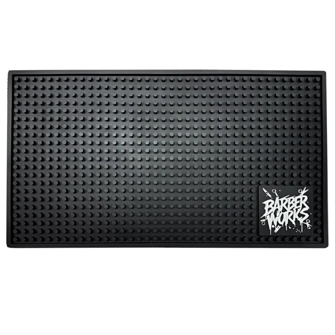 “Heat‑resistant Barber Works tool mat 17.5 × 10 inches on Las Vegas barbershop workstation”