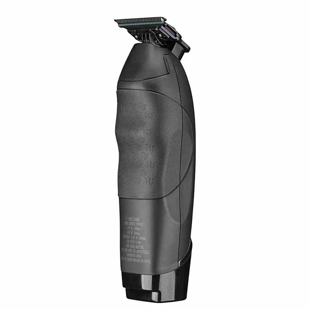 "Ergonomic handle with rubber grip and finger grooves on the BaBylissPRO x Tomb45 Wireless Charging Trimmer"