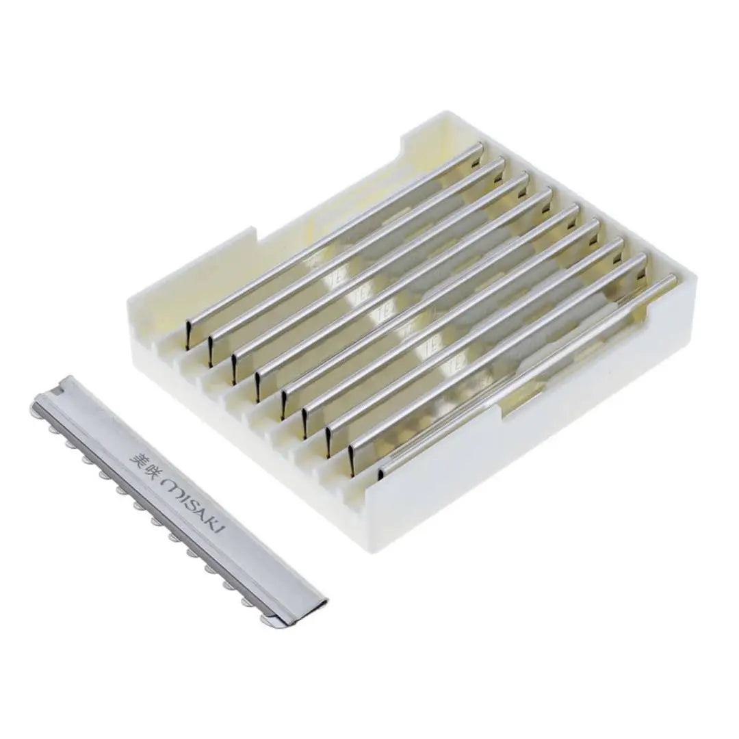 Set of Oshsaki razors in a white holder on a white background