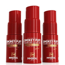 Three red bottles of Smokey Puff hair powder by Immortal NYC on a white background