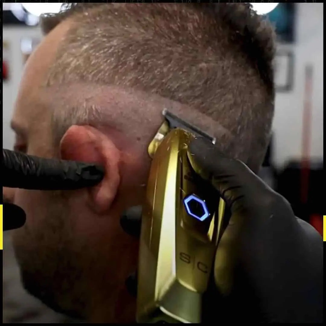 “Stylist installing Gold Titanium X-Pro blade on Gamma+ trimmer for precision lining.”