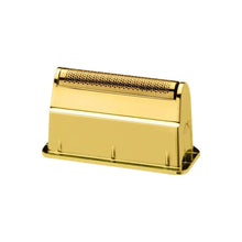 Gold-colored metal object with textured top on a white background