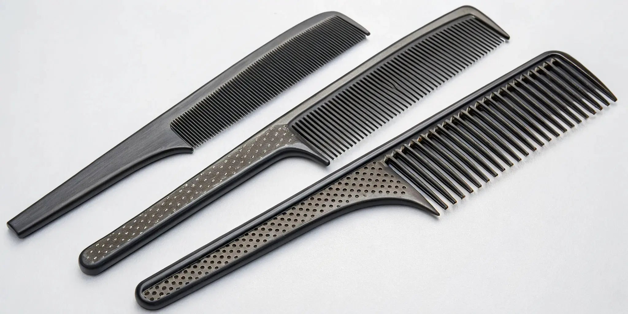 Best carbon fiber comb set for fades with anti-static teeth for clean lines.