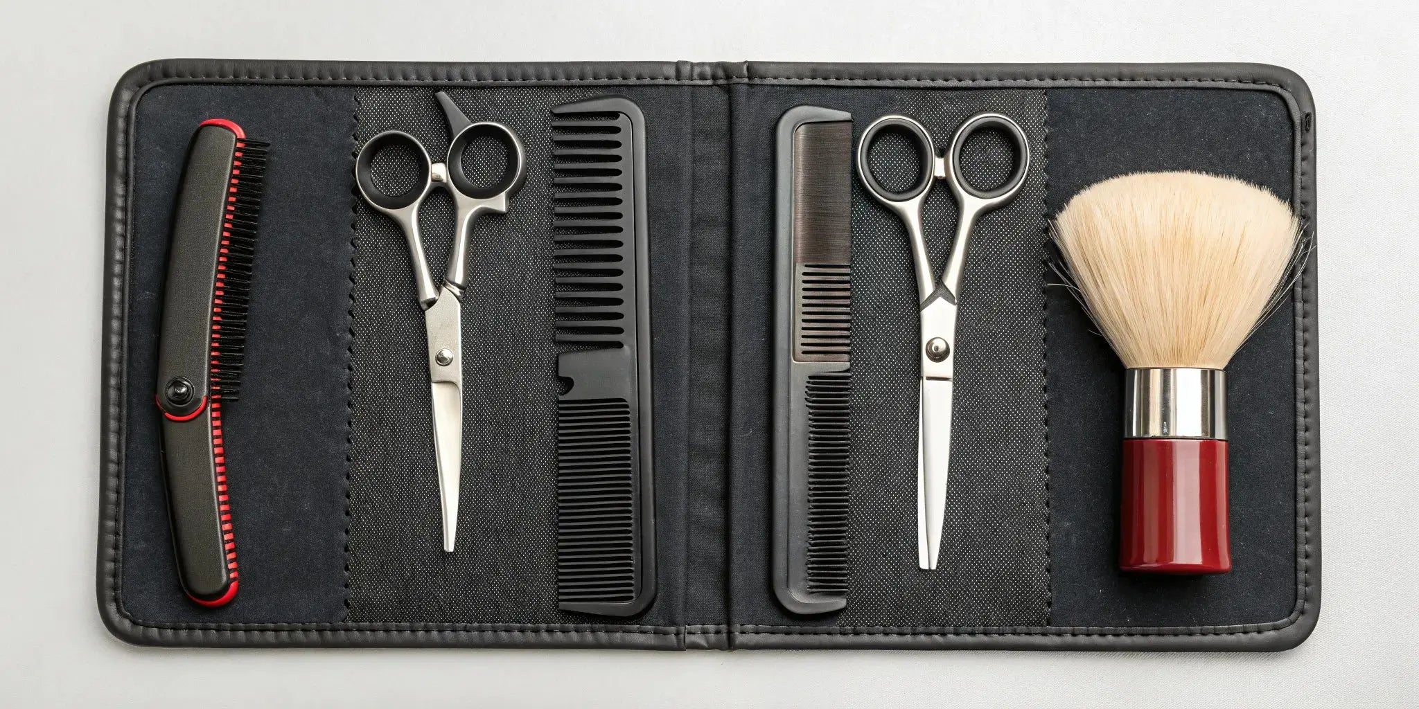 A complete professional barber combo set featuring a clipper and a detail trimmer.