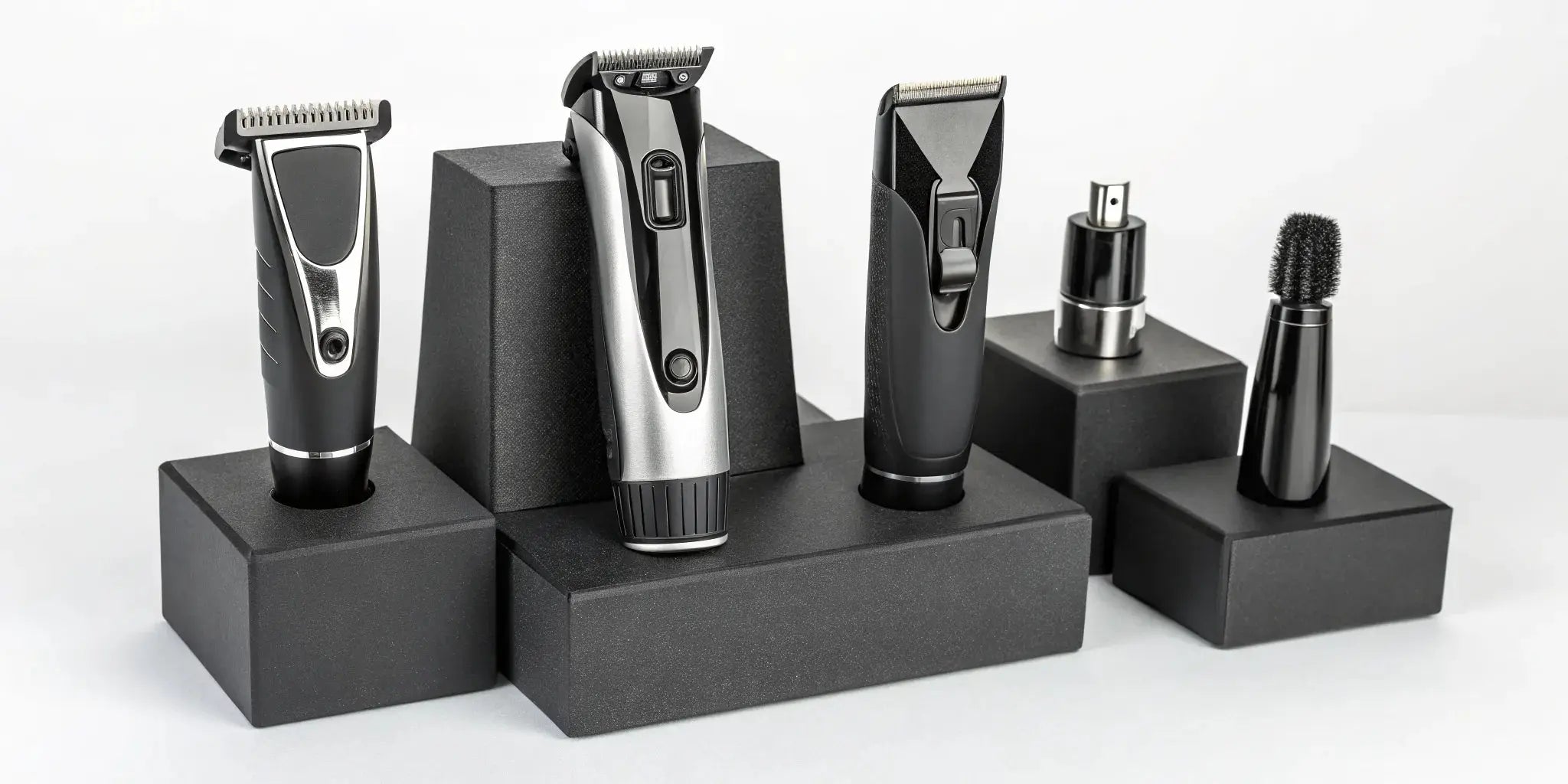 Professional clipper and trimmer set with various comb attachments for barbers and stylists.