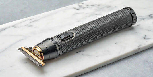 Andis T-Outliner skeleton trimmer with an exposed gold T-blade.