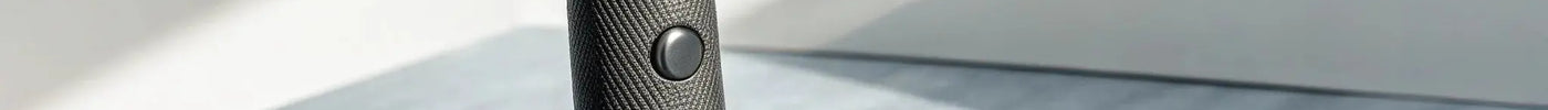 Professional Andis 04710 T-Outliner trimmer with its carbon-steel T-blade.