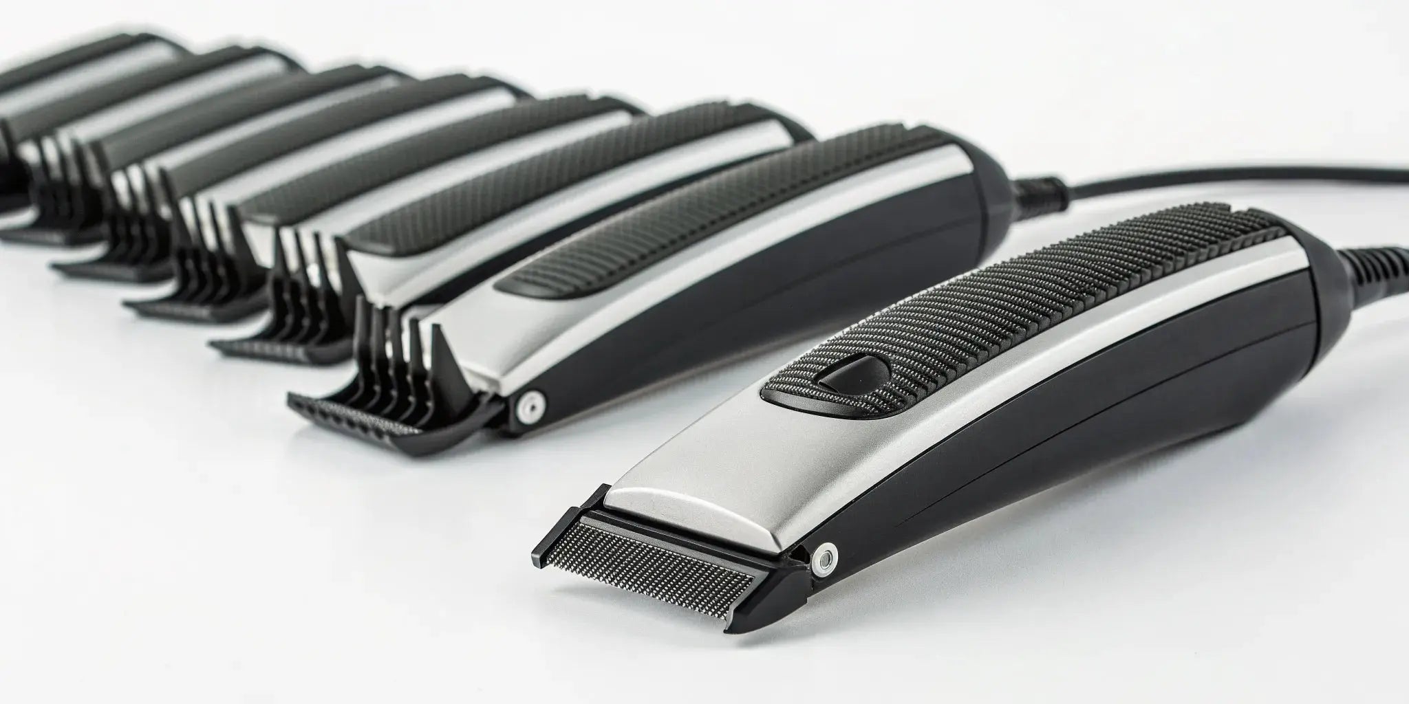 Andis T-Outliner trimmer with guide combs for wholesale purchase.