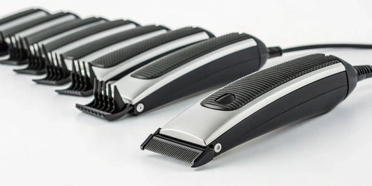 Andis T-Outliner trimmer with guide combs for wholesale purchase.