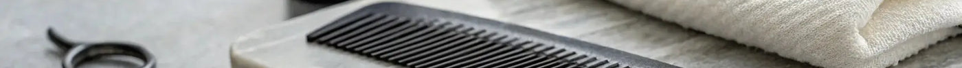 A durable, anti-static carbon fiber comb for professional hair styling.