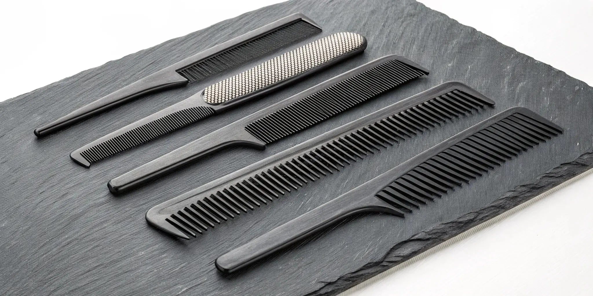 Professional carbon fiber comb set for barbers.