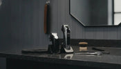Corded and cordless professional clippers on a barber workstation