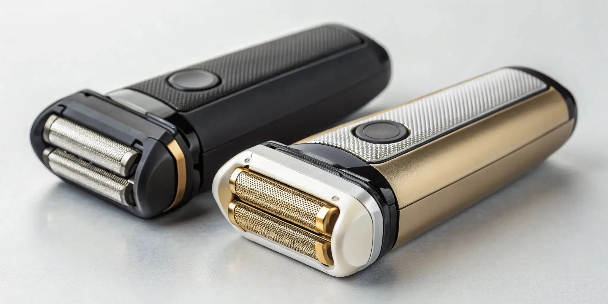 A cordless foil shaver and a rotary shaver placed side-by-side for comparison.