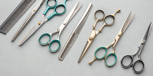 A professional set of discount barber shears and a matching comb.