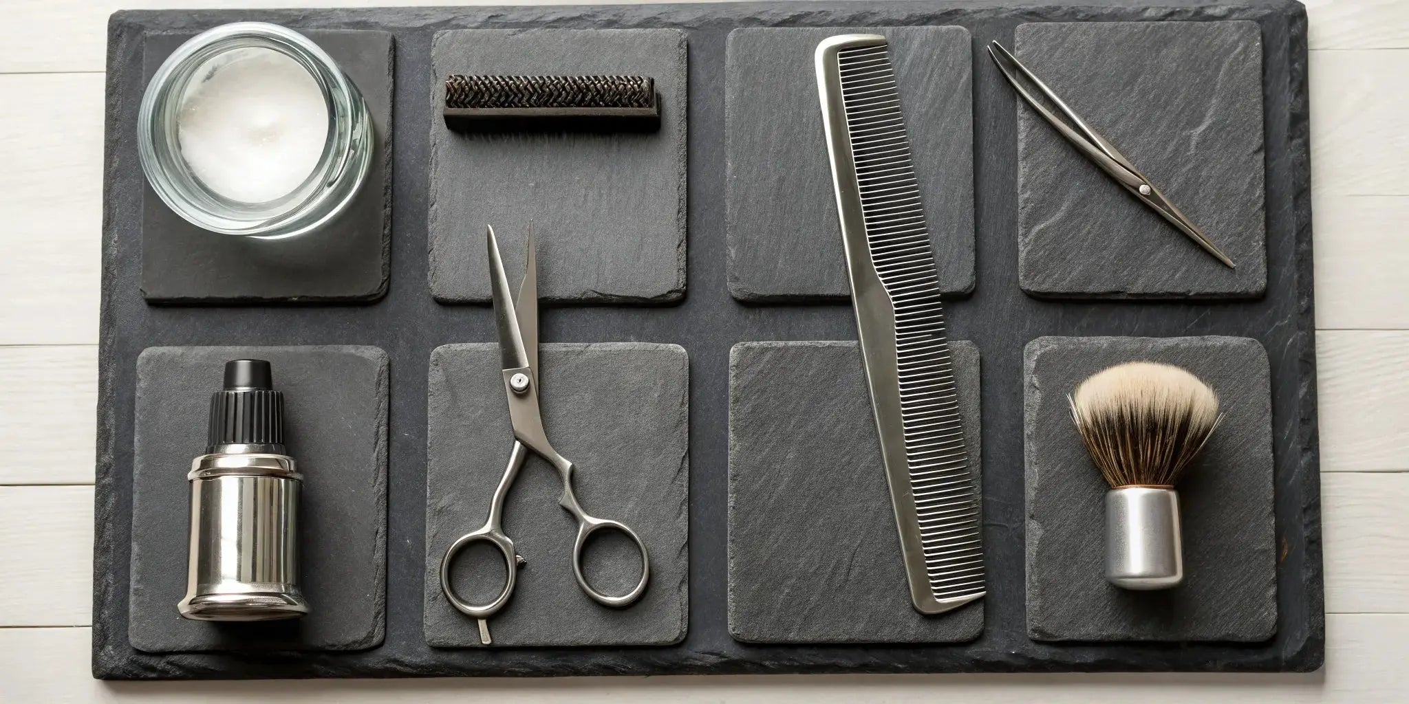 A collection of professional barber tools for precision hair cutting and styling.
