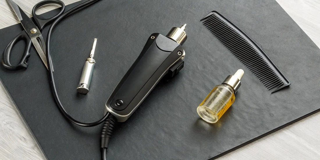 Heavy duty clippers with oil, a comb, and scissors for proper maintenance.