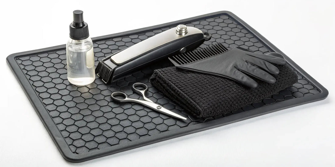 A clipper maintenance kit with oil, a brush, and blade wash for cleaning clippers.