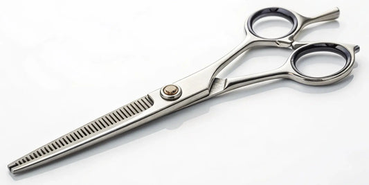 A pair of Kamisori shears laid out for professional sharpening and maintenance.