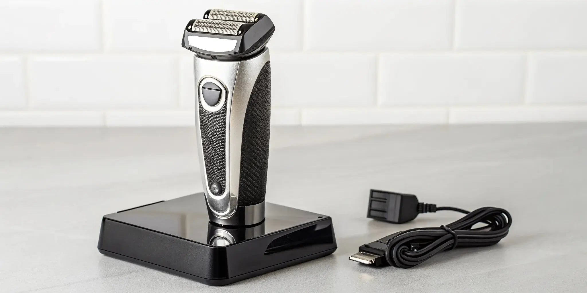 A premium pro foil shaver on its charging stand, reflecting the quality behind its price.