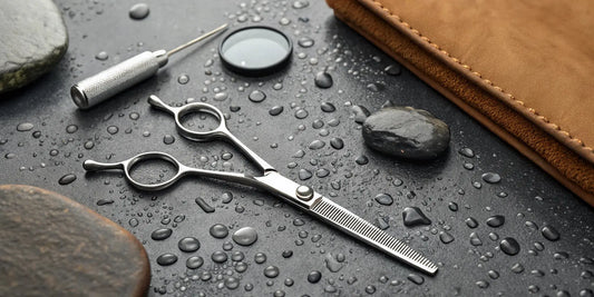 Professional shear sharpening for barbers using a whetstone.