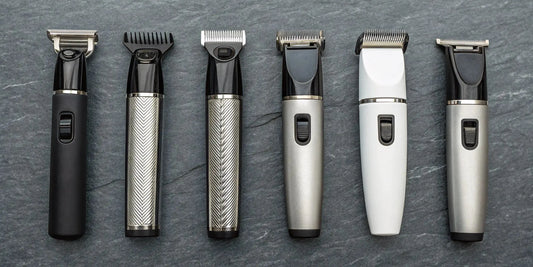 The six best trimmers for professional barbers lined up side-by-side.