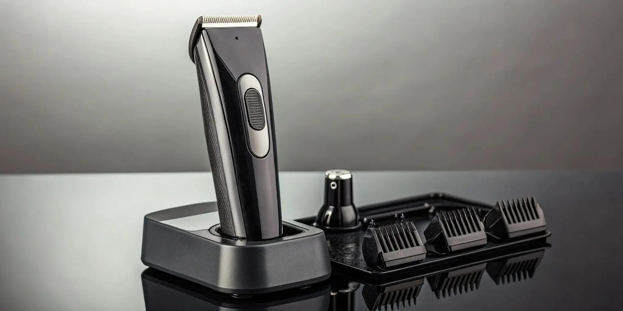 A professional cordless clipper seated in its charging dock.