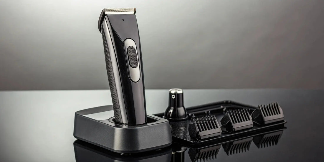 A professional cordless clipper seated in its charging dock.