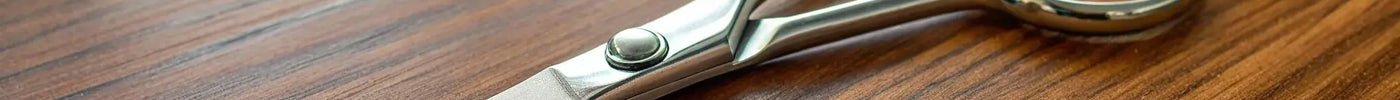 Japanese crafted Kamisori shears with an ergonomic design for professional stylists.