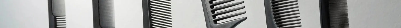 A professional carbon fiber comb set for barbers being reviewed.