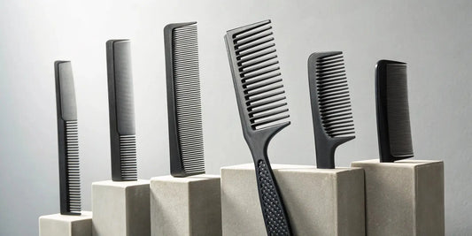 A professional carbon fiber comb set for barbers being reviewed.