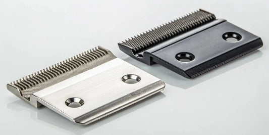 Wahl vs Andis clipper blades placed side-by-side for comparison.