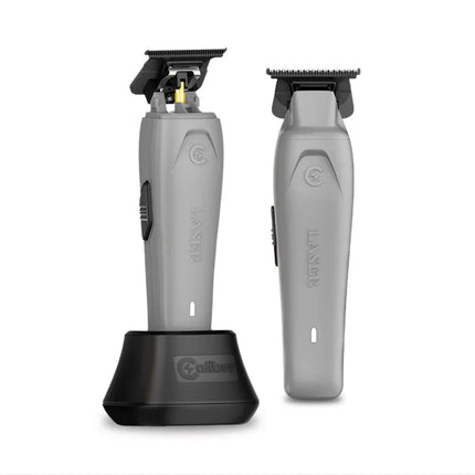 “Assorted Caliber professional trimmers—Laser, Solo, and 9 mm models—displayed on a barber station with zero-gapped DLC blades.”