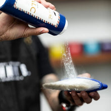 “Johnny B. Talc 7 oz used after shave on neckline to reduce moisture and redness.”