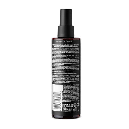 STMNT  Back view of a black spray bottle with text on a white background