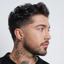 “Model with defined, soft curls styled using STMNT Curl Cream”

