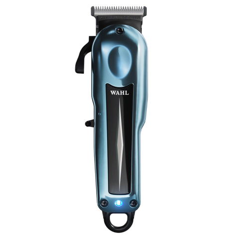 “Barber using Wahl Super Taper X to create a guideline during a skin fade.”

