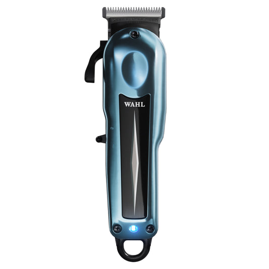 “Barber using Wahl Super Taper X to create a guideline during a skin fade.”

