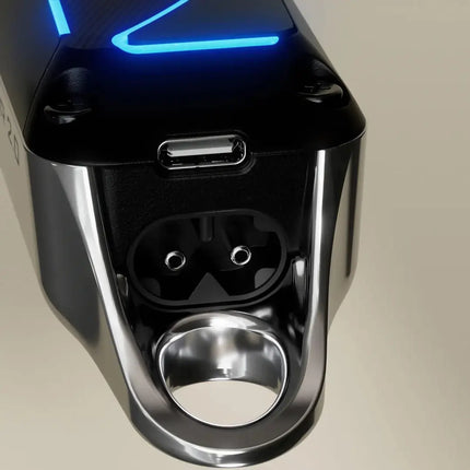 Close-up of a Wahl Senior 2.0 Clipper Cordless/Corded  with USB charging port and blue light indicator.