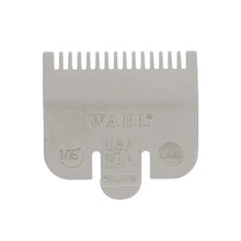 “Wahl light-gray 1/16 inch (#0.5) clipper guard on white background.”

