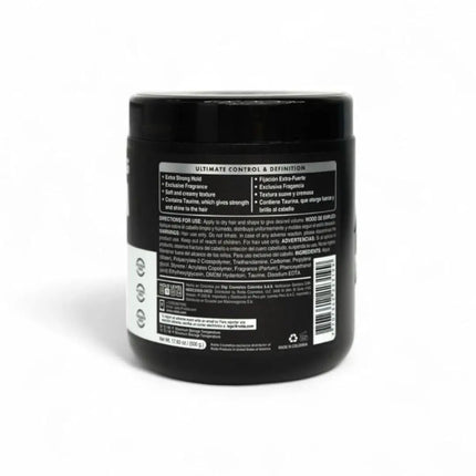 A black plastic jar of hair care product shown from the back, displaying a white label with text and a barcode on a white background.