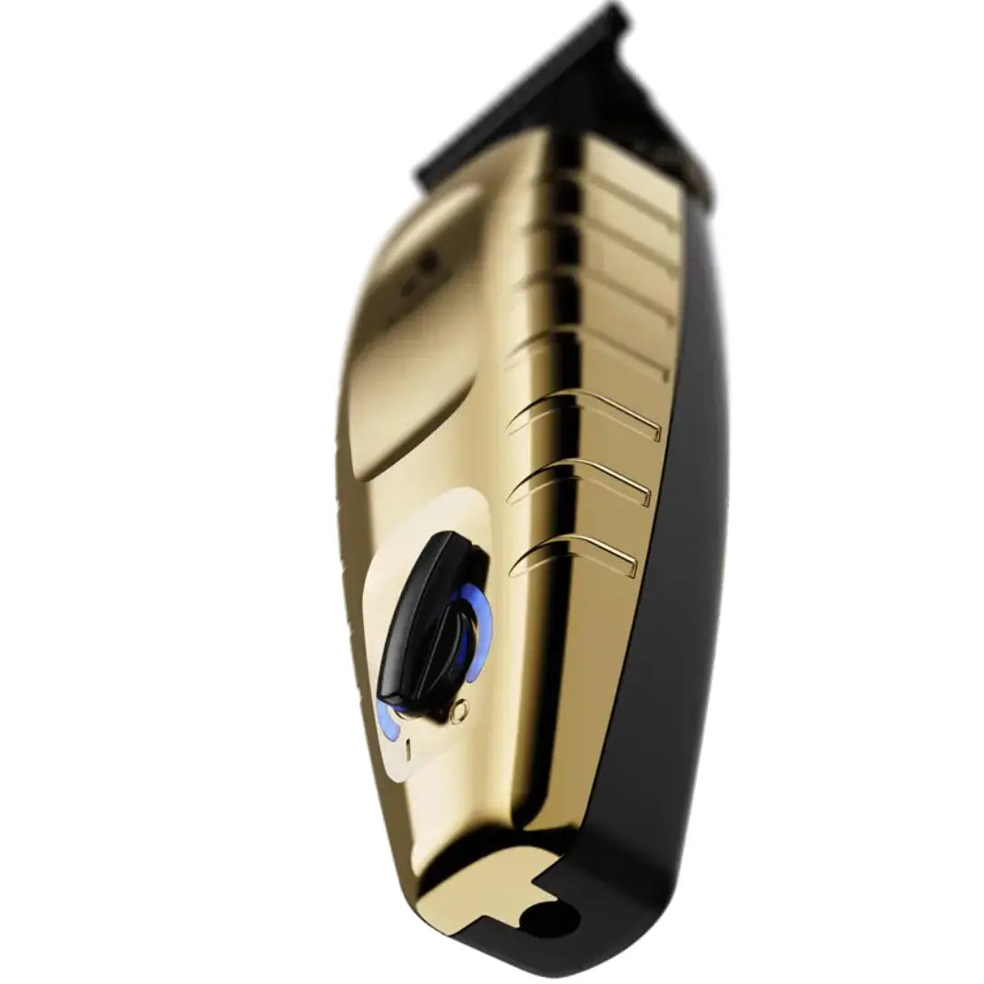 Gold and black device with a prominent button on a white background GTX-EXO® II Gold Trimmer