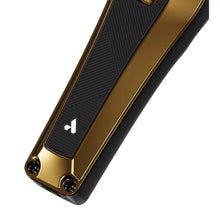 Gold and black electronic device with a brand logo on a white background