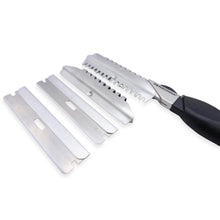 A metal grooming or shaving tool set with multiple interchangeable silver blades and a black-handled tool, photographed on a plain white background.