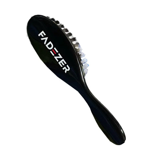 A black hair brush with metal bristles, featuring the brand name 'FADEZER' on the handle.