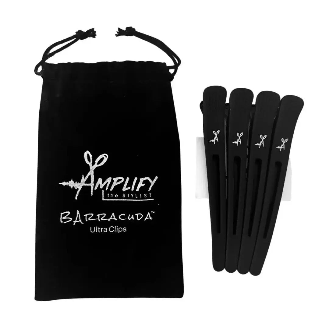 Black hair clips with 'Amplify the Stylist' branded pouch on a white background