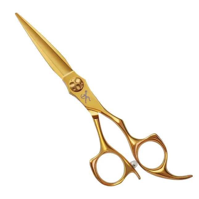Gold scissors on a white background